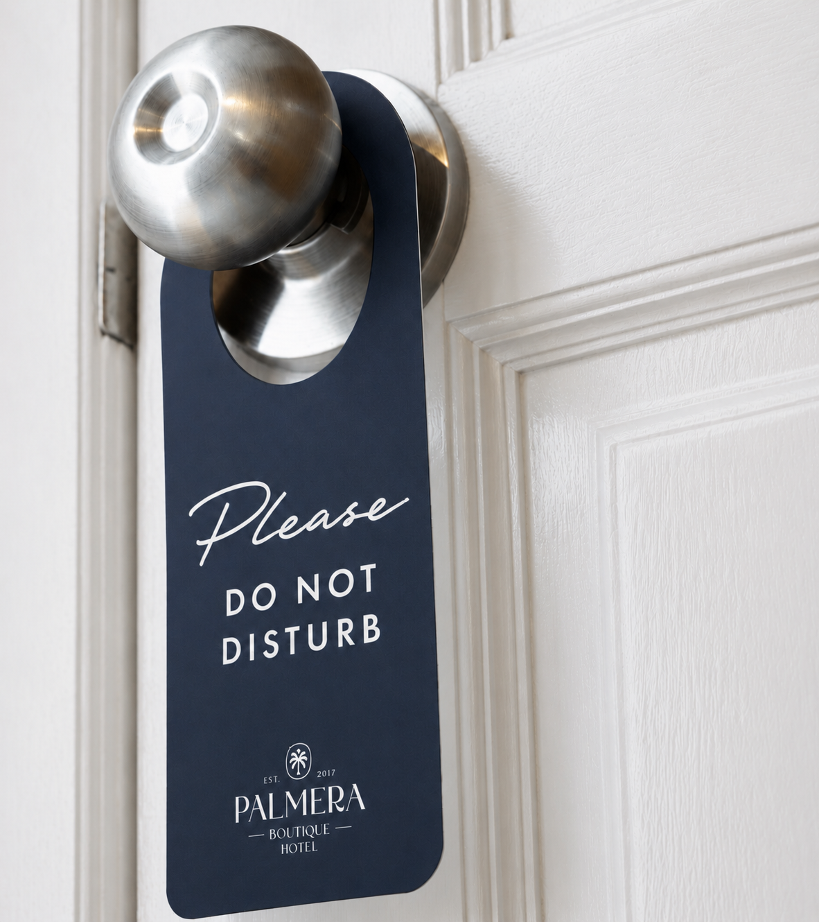 Palmera Boutique Hotel branding applied to door hanger