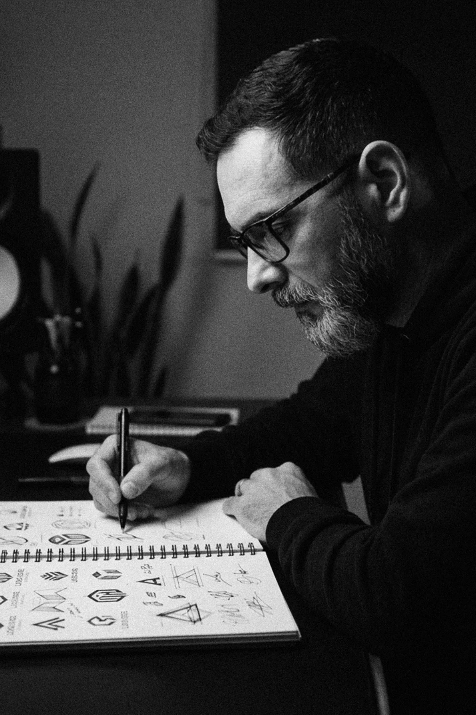 Santiago Design Co. working on logo drafts