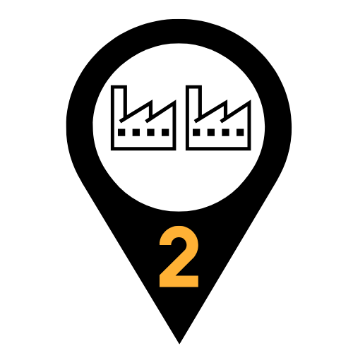 Icon of two factory buildings with chimneys inside a white circle on a black background, number 2 below.