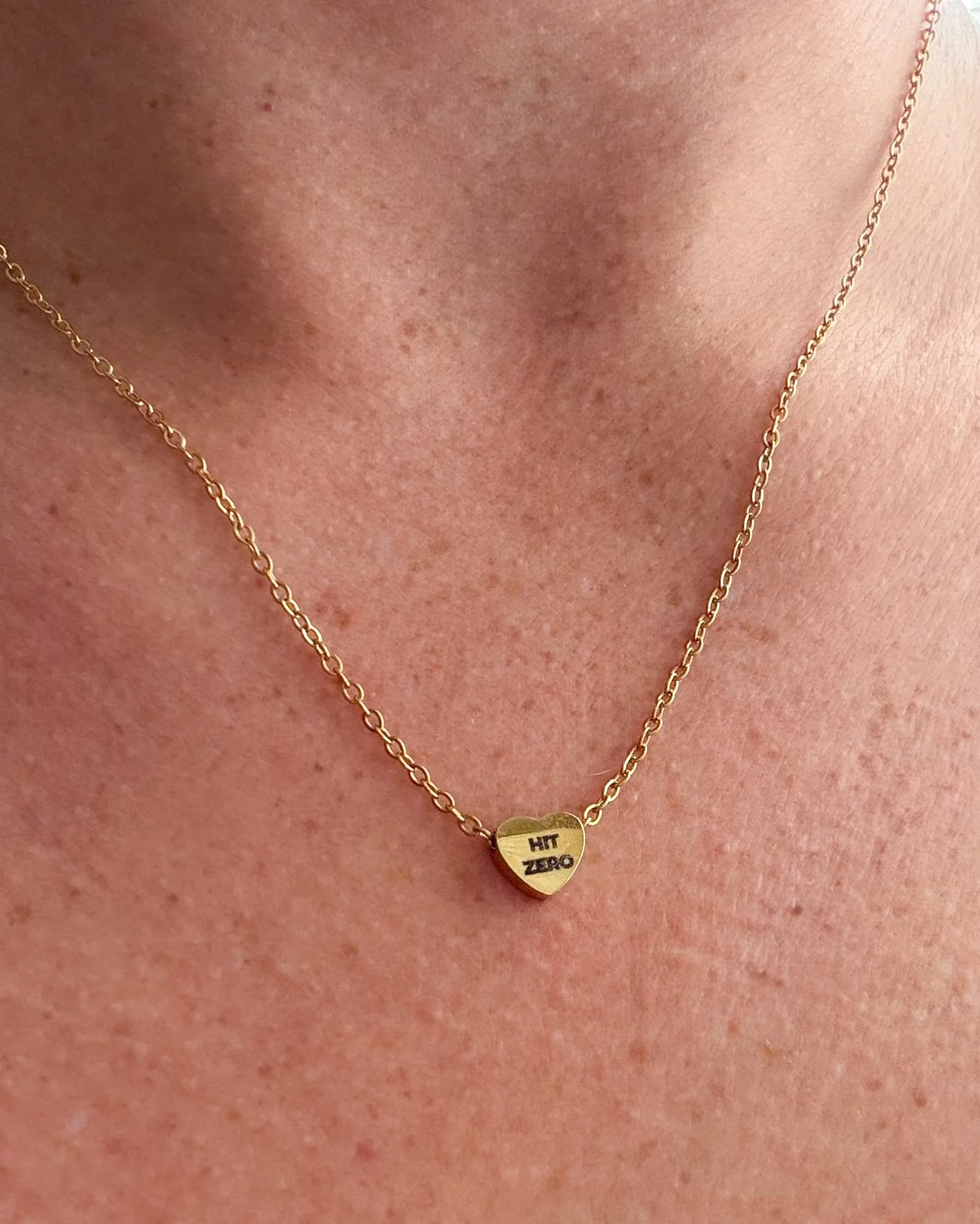 hit-zero-cheer-necklace-gold-heart.jpg