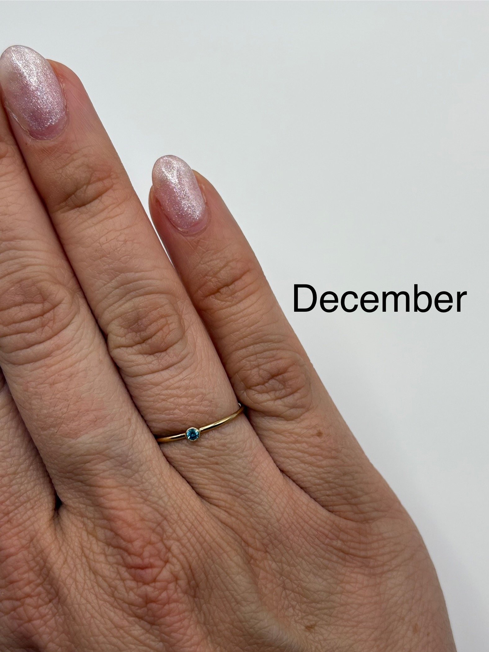 Gold December Ring.jpg