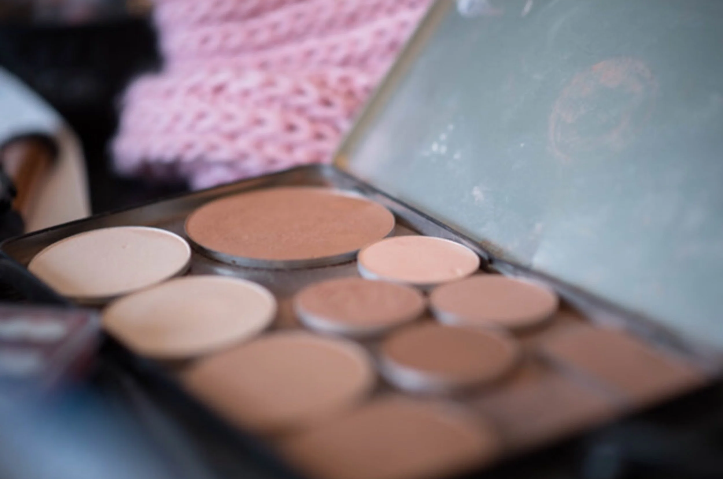 Discreet makeup artist working one-on-one with a client in a private setting in the Greater Toronto Area