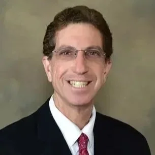 A headshot of Jeffrey Hansher.