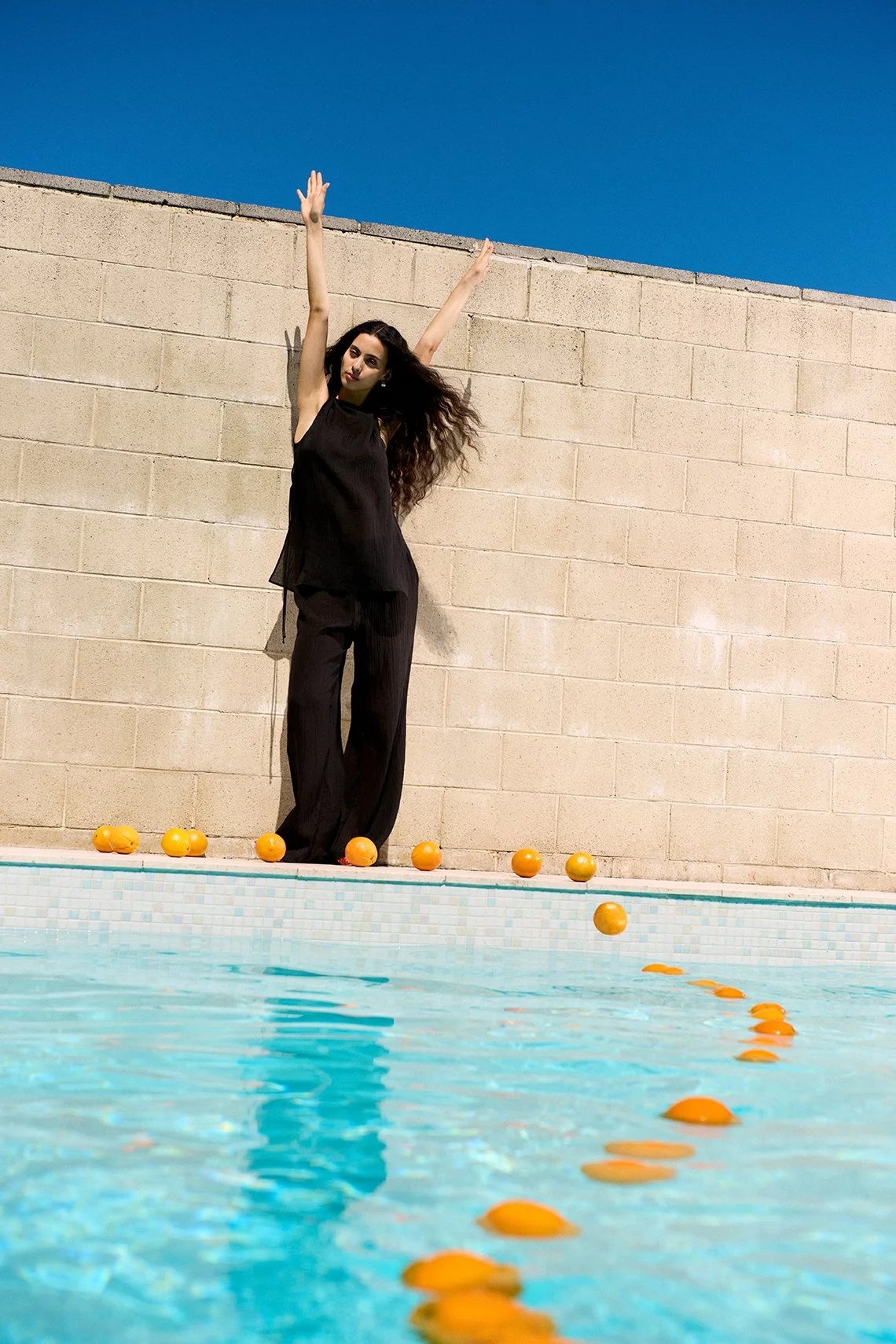 NL_6_WITH ORANGE DROPPING OFF POOL.jpg