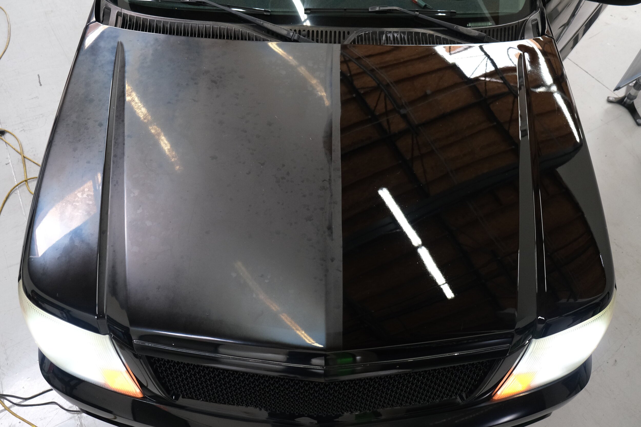 Black Cadillac SUV Paint Correction