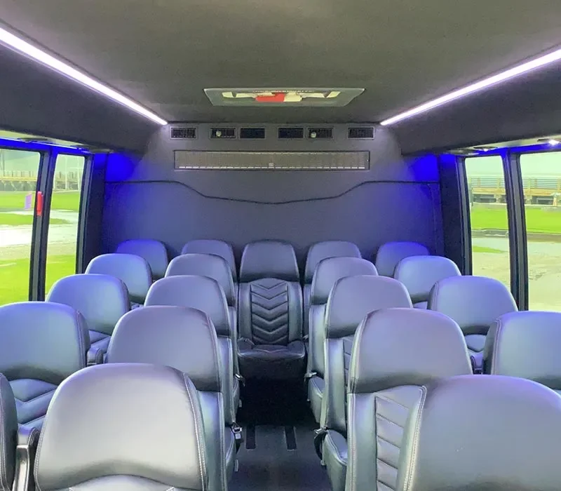 Party bus interior with leather chairs