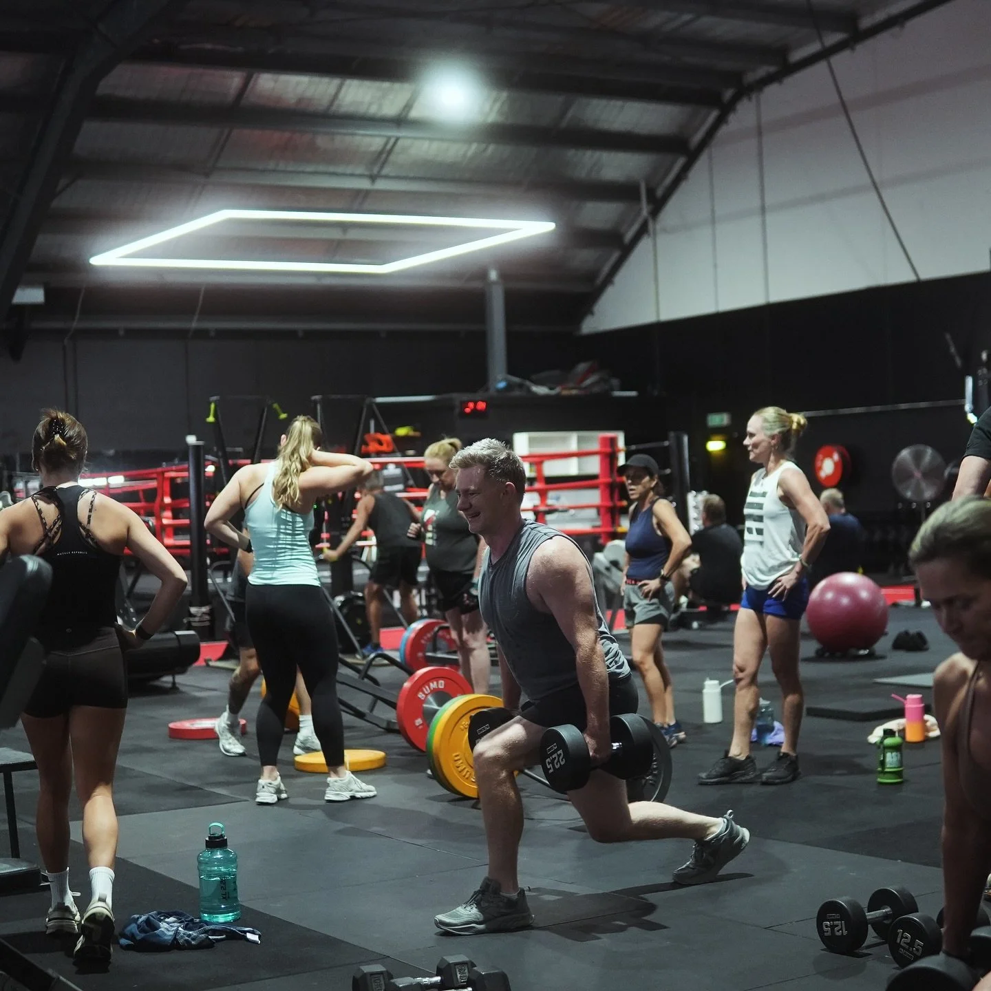 Member performing lunges during a strength and conditioning class at Millgate Boxing Bayside Melbourne