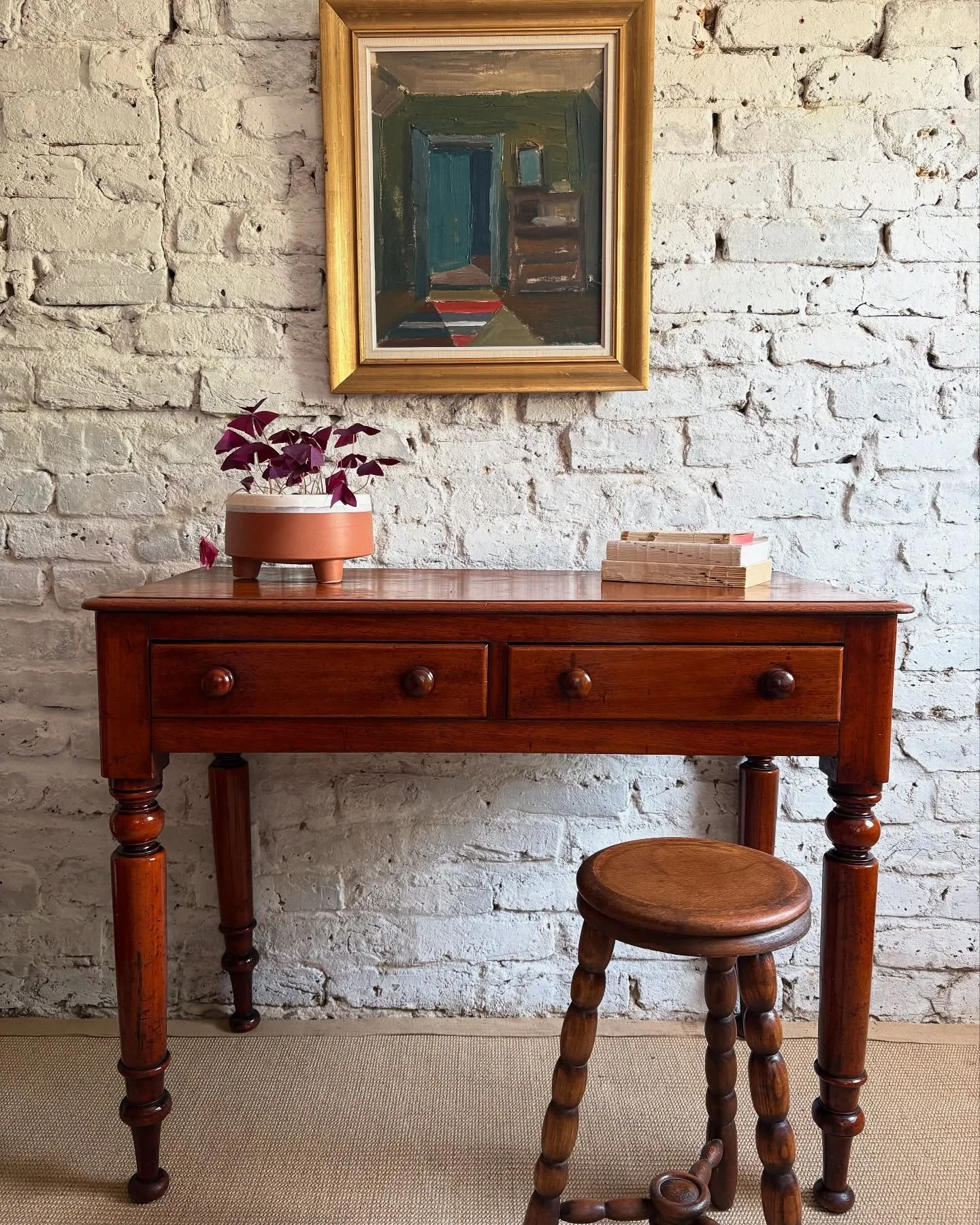 The glossiest of writing tables. A warm mahogany glow, paired with the patina of age, creates a beautiful piece that's full of Victorian charm. The turned legs and smooth double drawers offer perfect finishing touches.
.
.
#antiquefurniture #vintage 