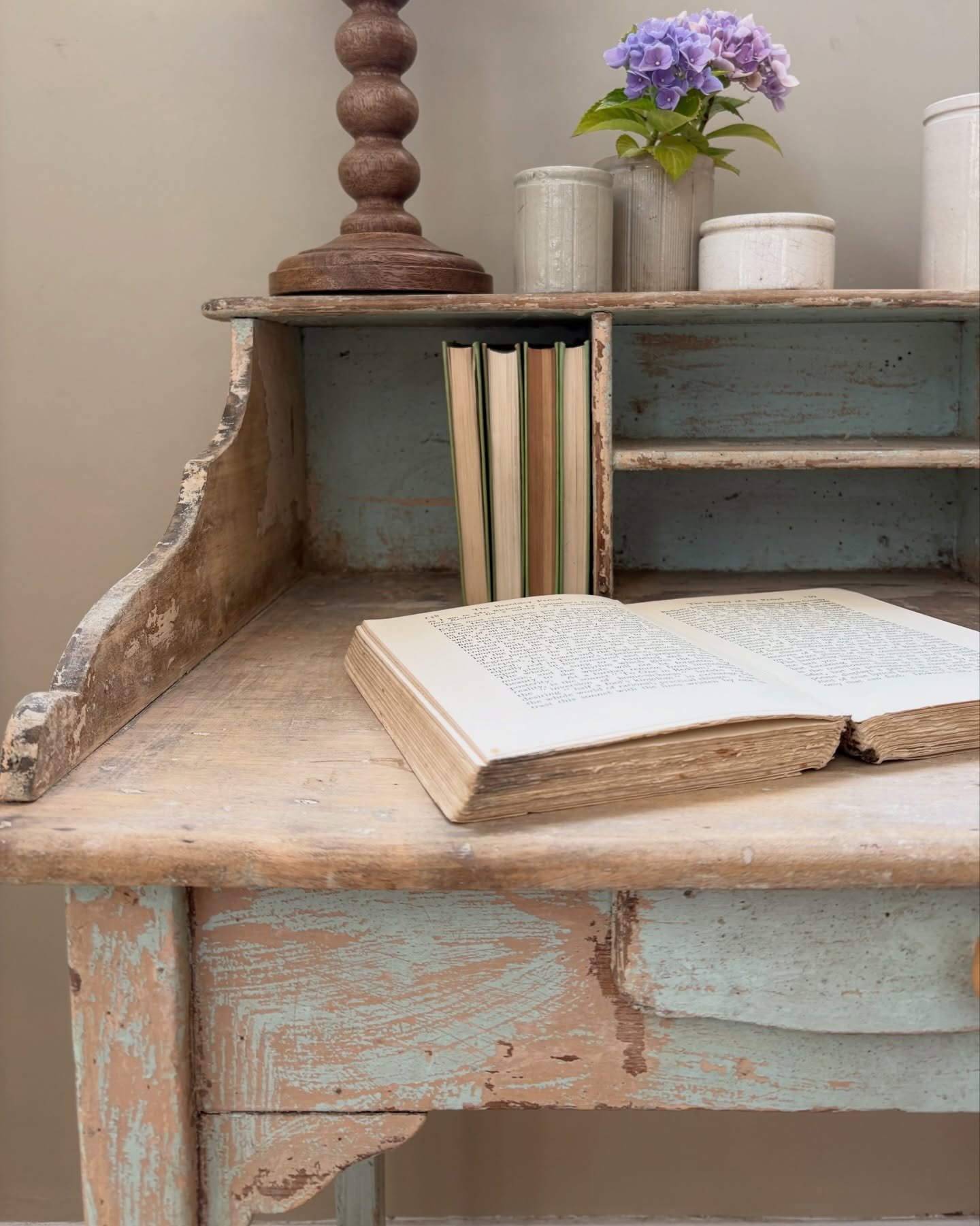 The most wonderful little French vintage desk, with a glorious distressed duck egg blue patina that&rsquo;s impossible to replicate. Layers of pale timber, soft off-white tones and charming traces of old labels tell the story of a well-loved life, ad