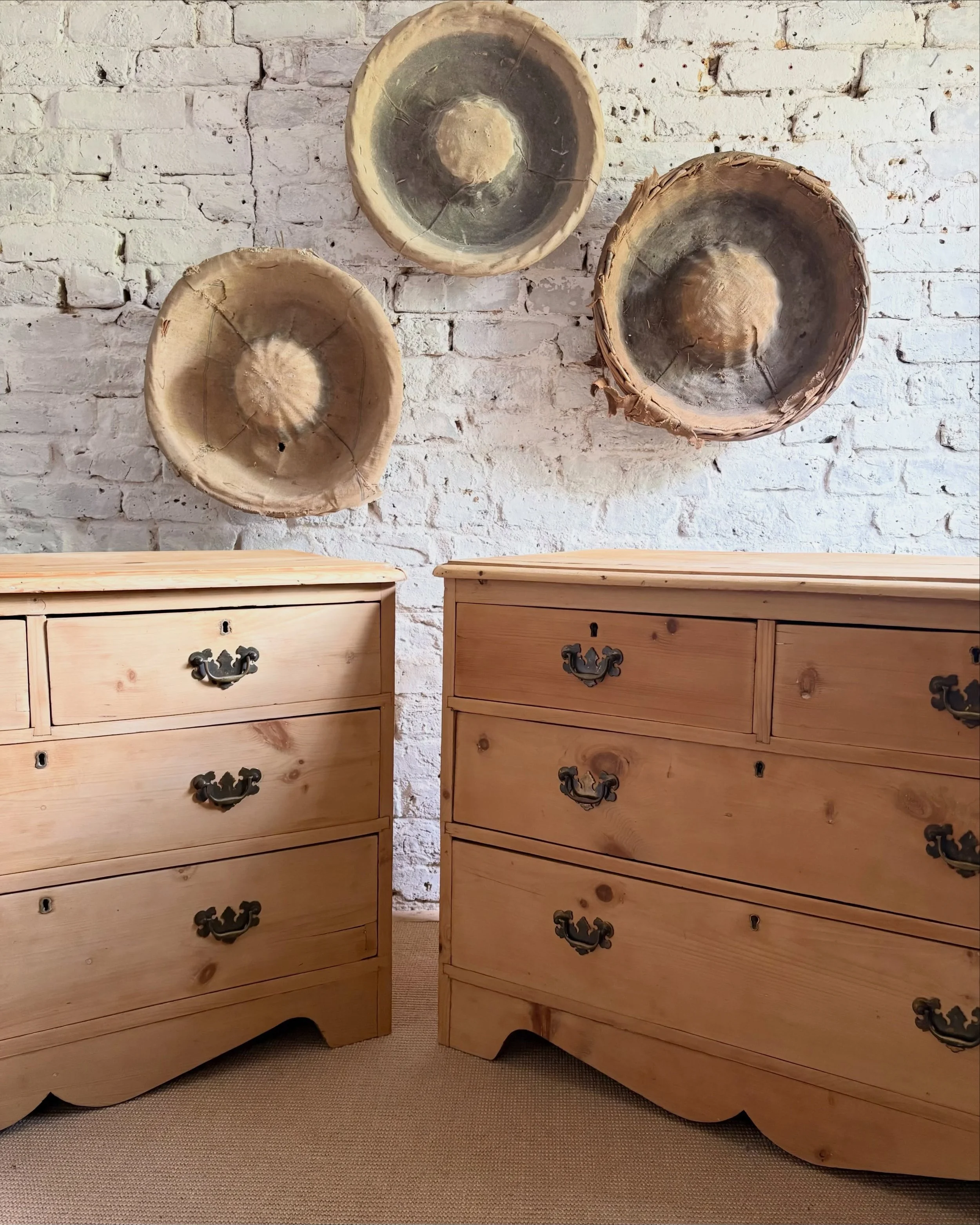 A beautiful matching pair of antique pine chest of drawers, full of character and charm. In lovely condition throughout, with smooth-running drawers and a wonderfully warm tone enhanced by a fresh coat of beeswax.

This handsome duo would make fabulo