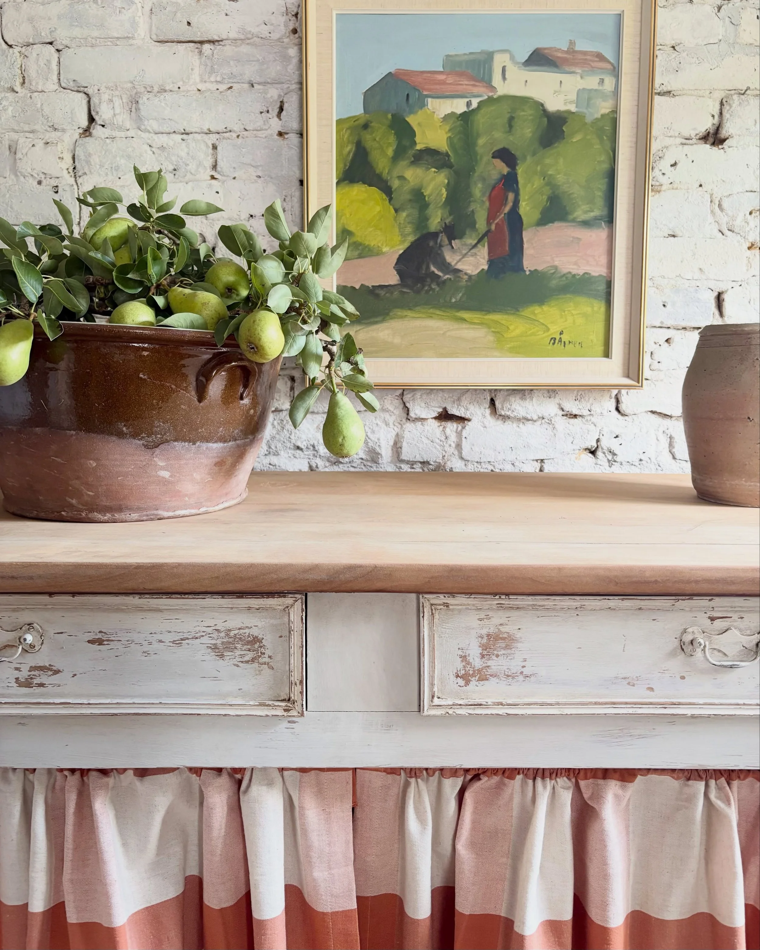 A characterful French open cupboard, full of rustic charm and effortless Mediterranean style. 

Finished in timeworn paint with a chunky timber top, rich with age-related marks and patina, this substantial piece makes a beautiful statement in a count