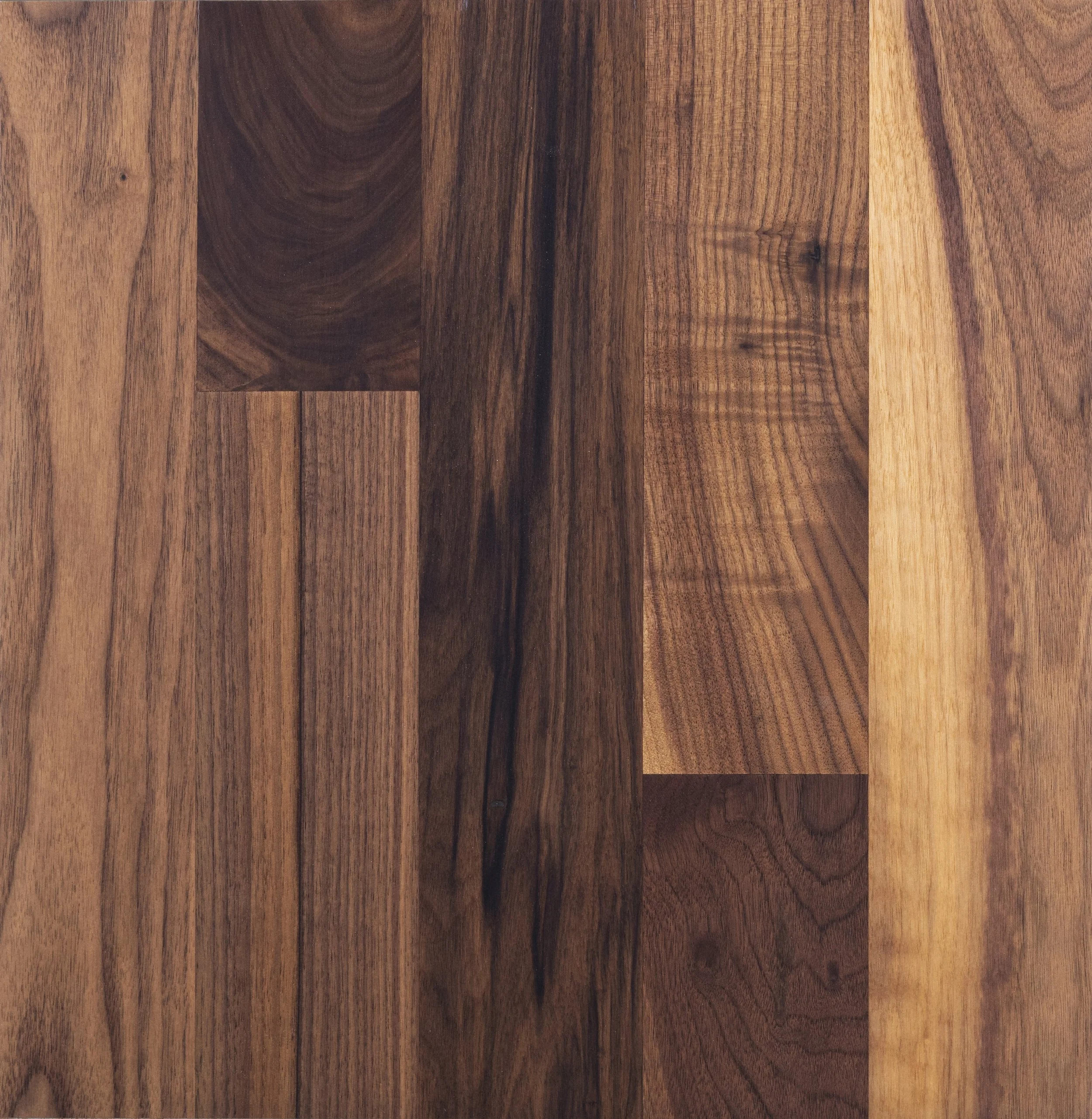 Close-up of dark wood grain texture with natural patterns.