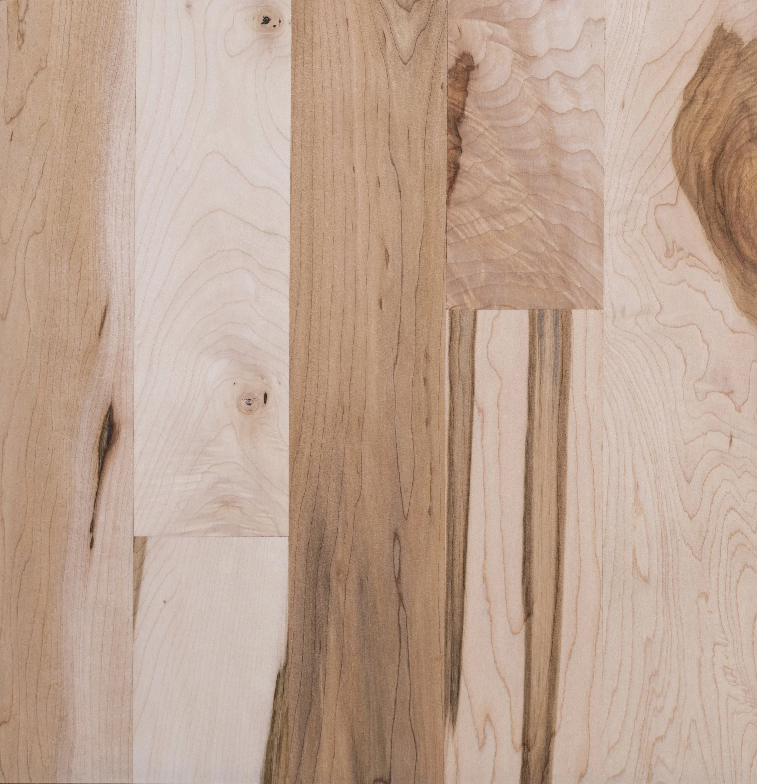 Close-up of natural wood grain texture with varying shades and patterns.