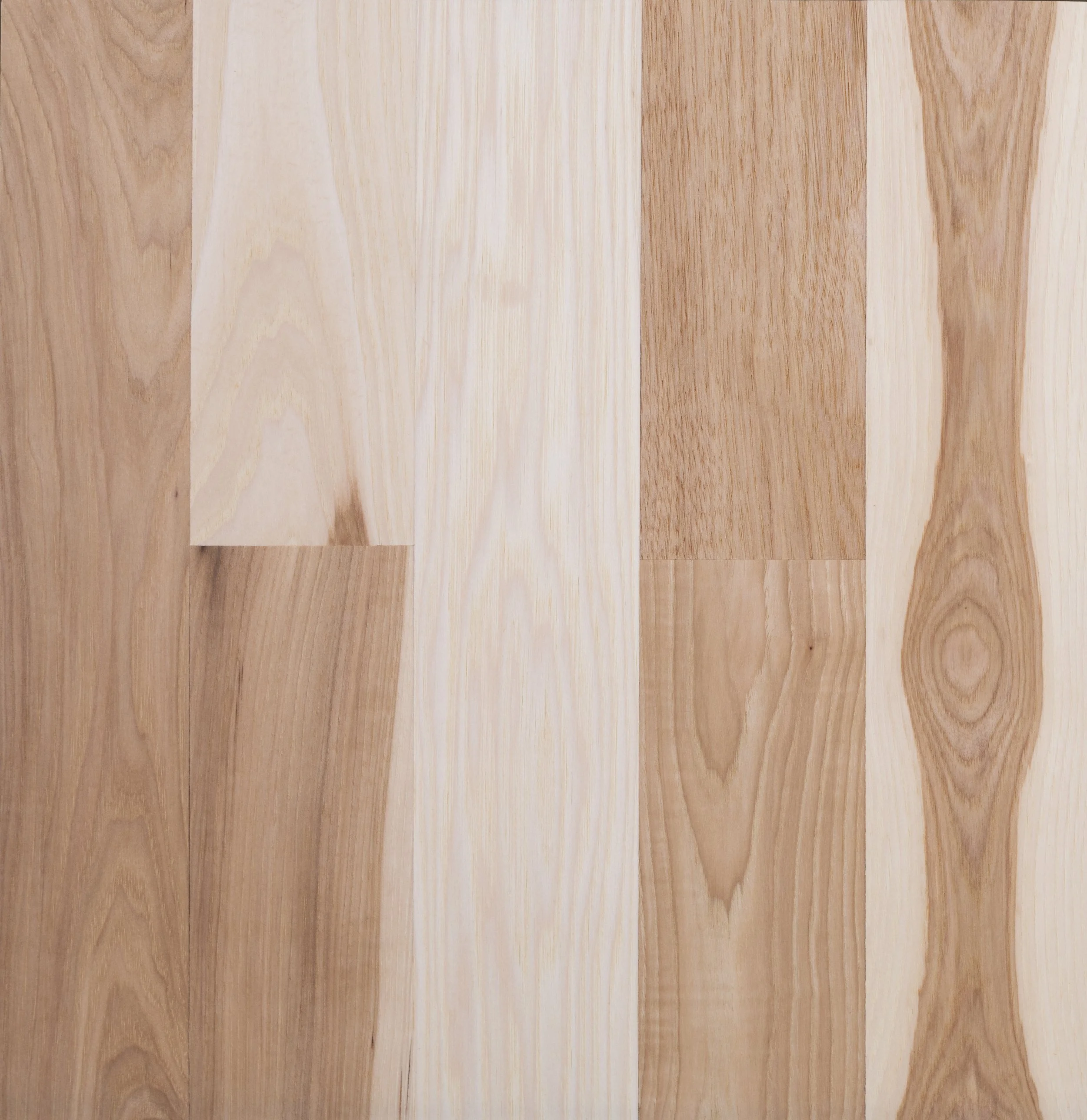 Wooden planks with various grain patterns and shades of brown and cream.