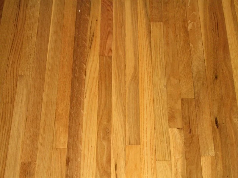 Wooden floor with natural finish and grain pattern