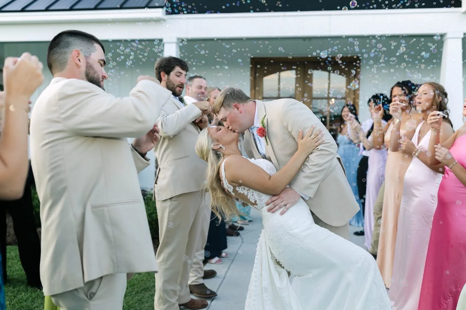 Bubble exit dip and kiss in courtyard at Twisted Vines Vineyard