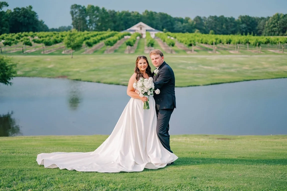 Connor Stephenson Photography:Pond, vineyard, and venue at twisted vines vineyard.
