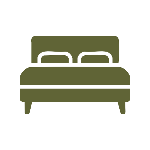 Icon of a bed with pillows and a headboard.