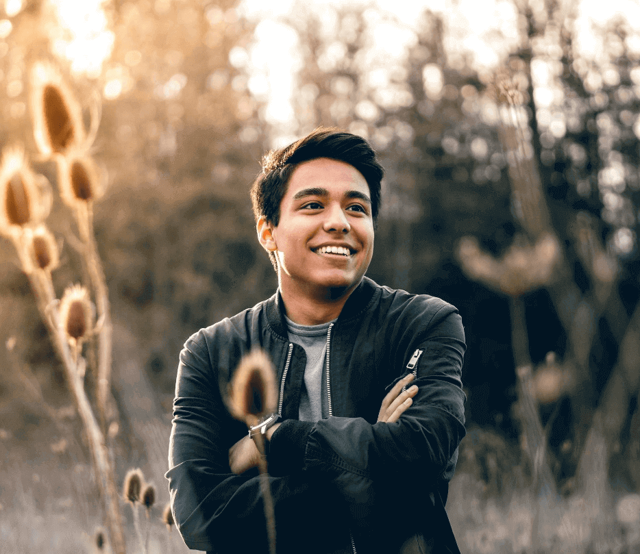 happy man after trauma therapy or counseling in Frisco, Texas