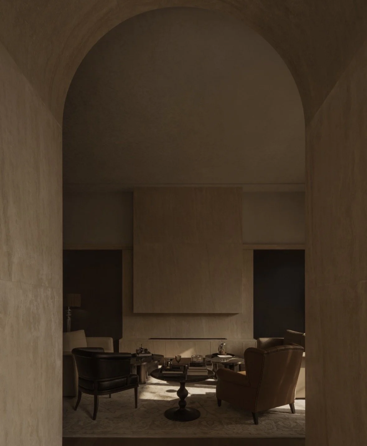 Modern living room with beige sofa, white chairs, black coffee table, patterned rug, and contemporary lighting fixtures.