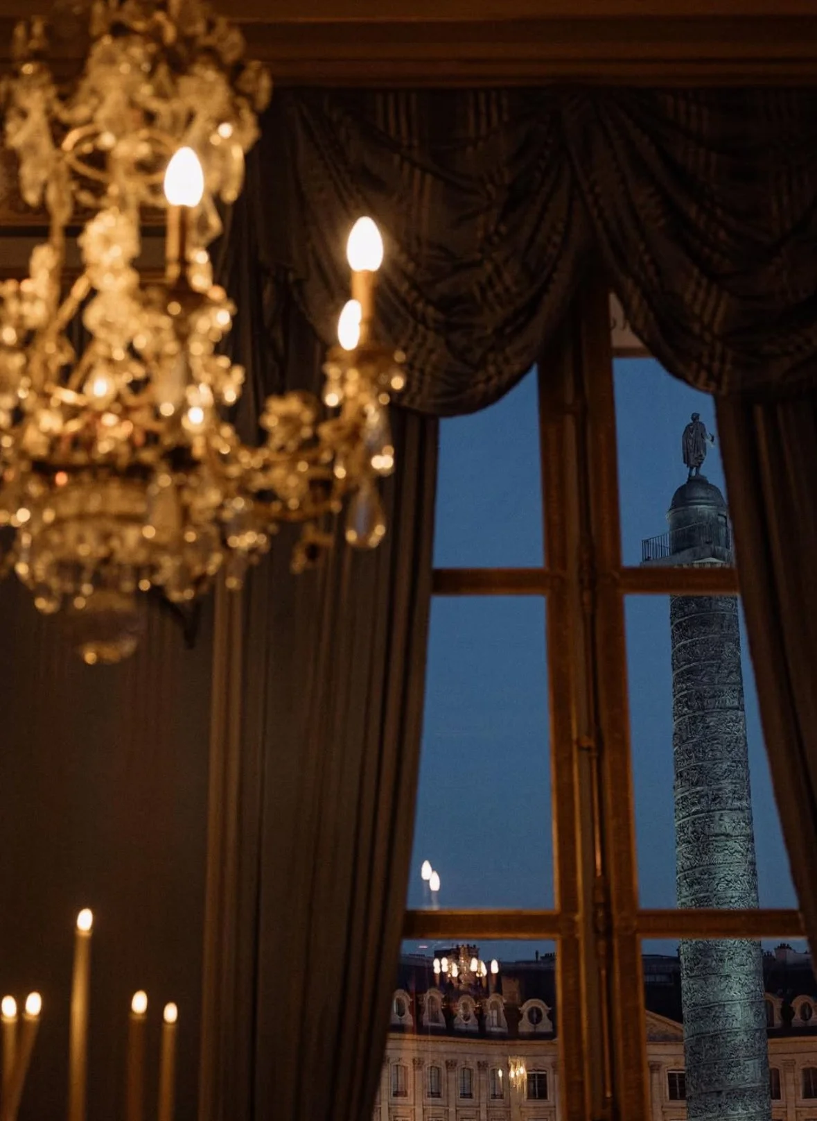 Elegant grand hotel salon with crystal chandelier in Place Vendome