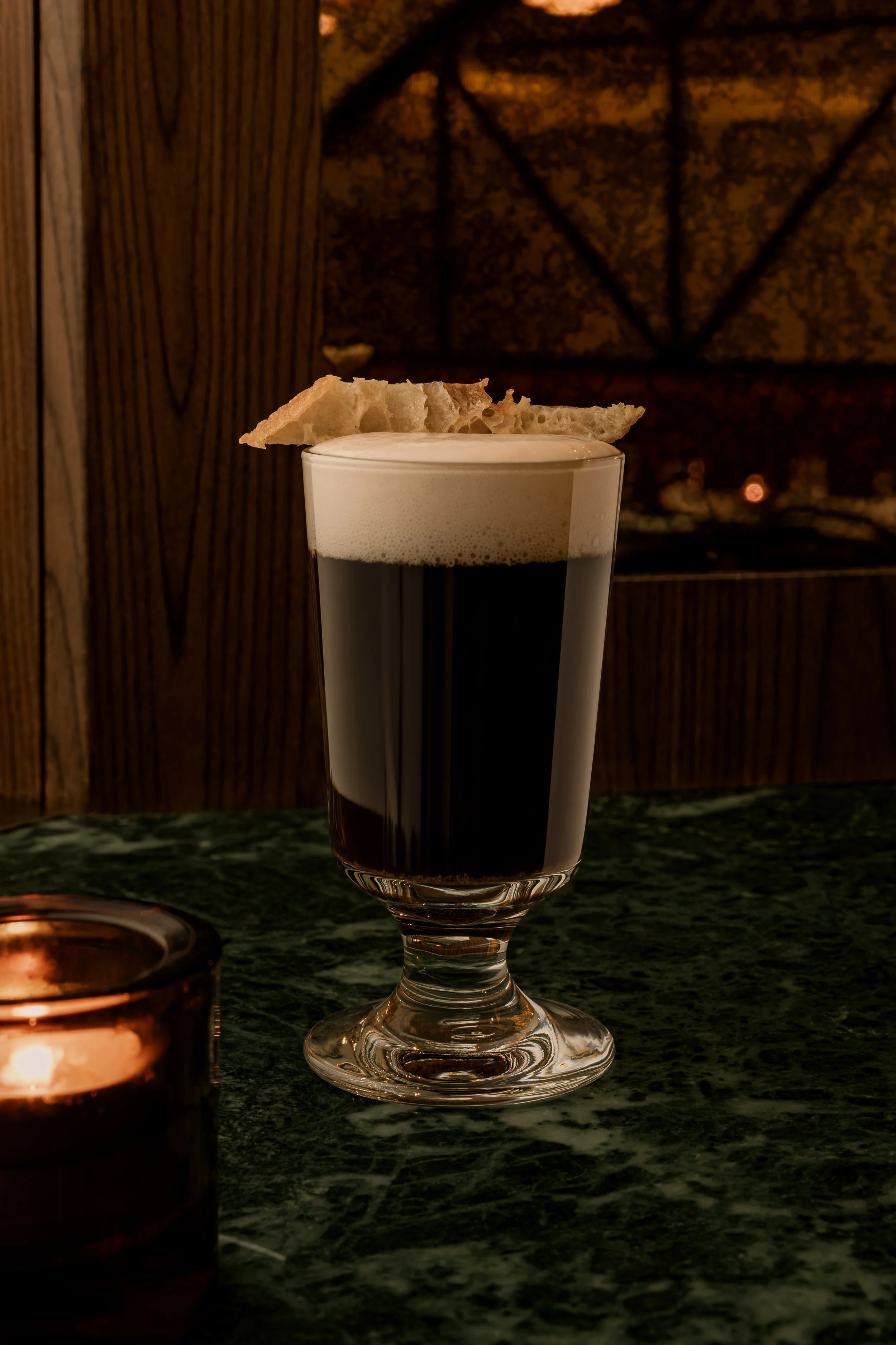 The Coffee Blazer is rich and warming, with bold Nanyang coffee, creamy tofu foam and gentle vanilla sweetness. Finished with crisp youtiao for a nostalgic contrast of textures and a lingering bittersweet coffee finish.