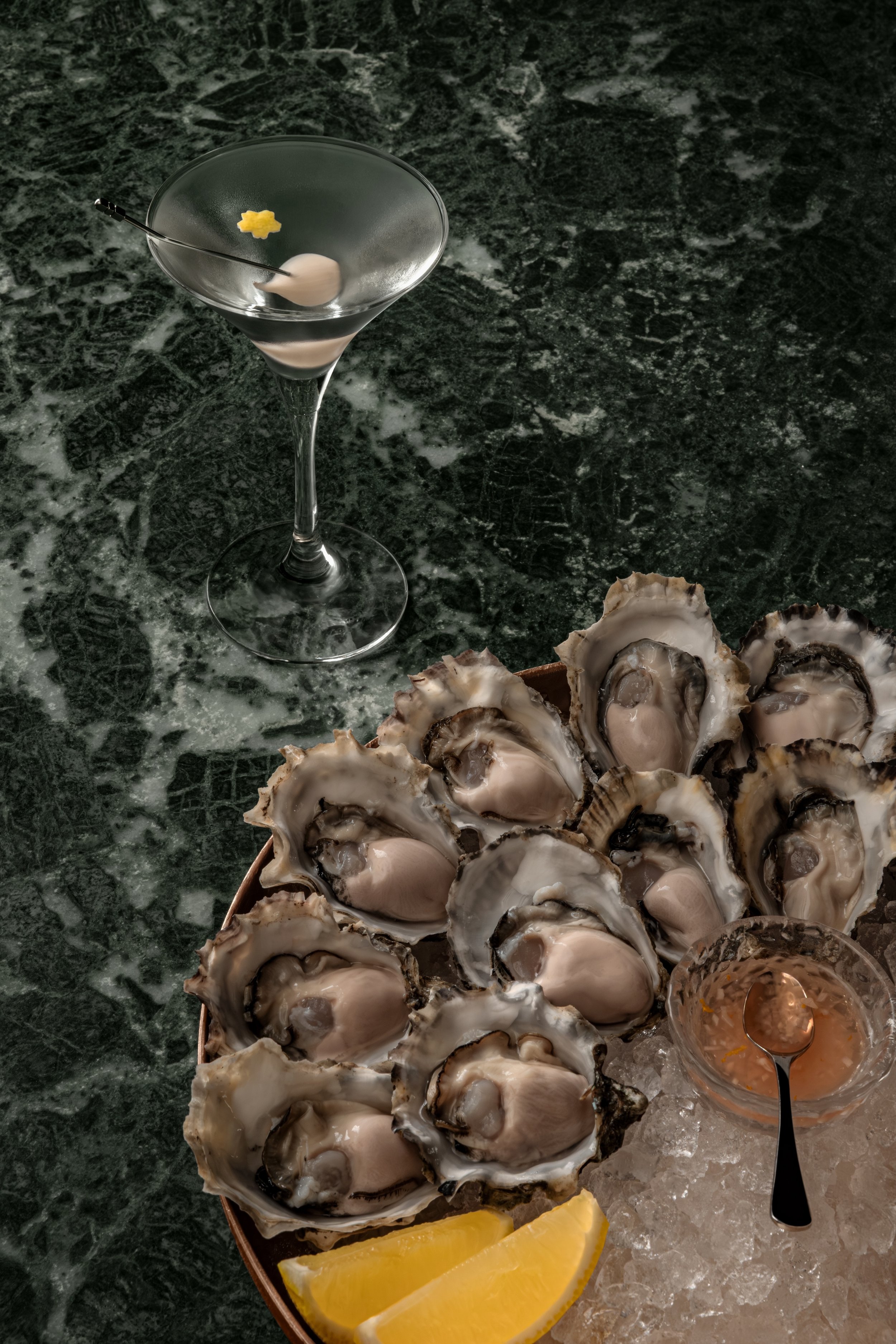 Gibson's hero cocktail and food ritual - the Gibson and freshly shucked seasonal oysters.