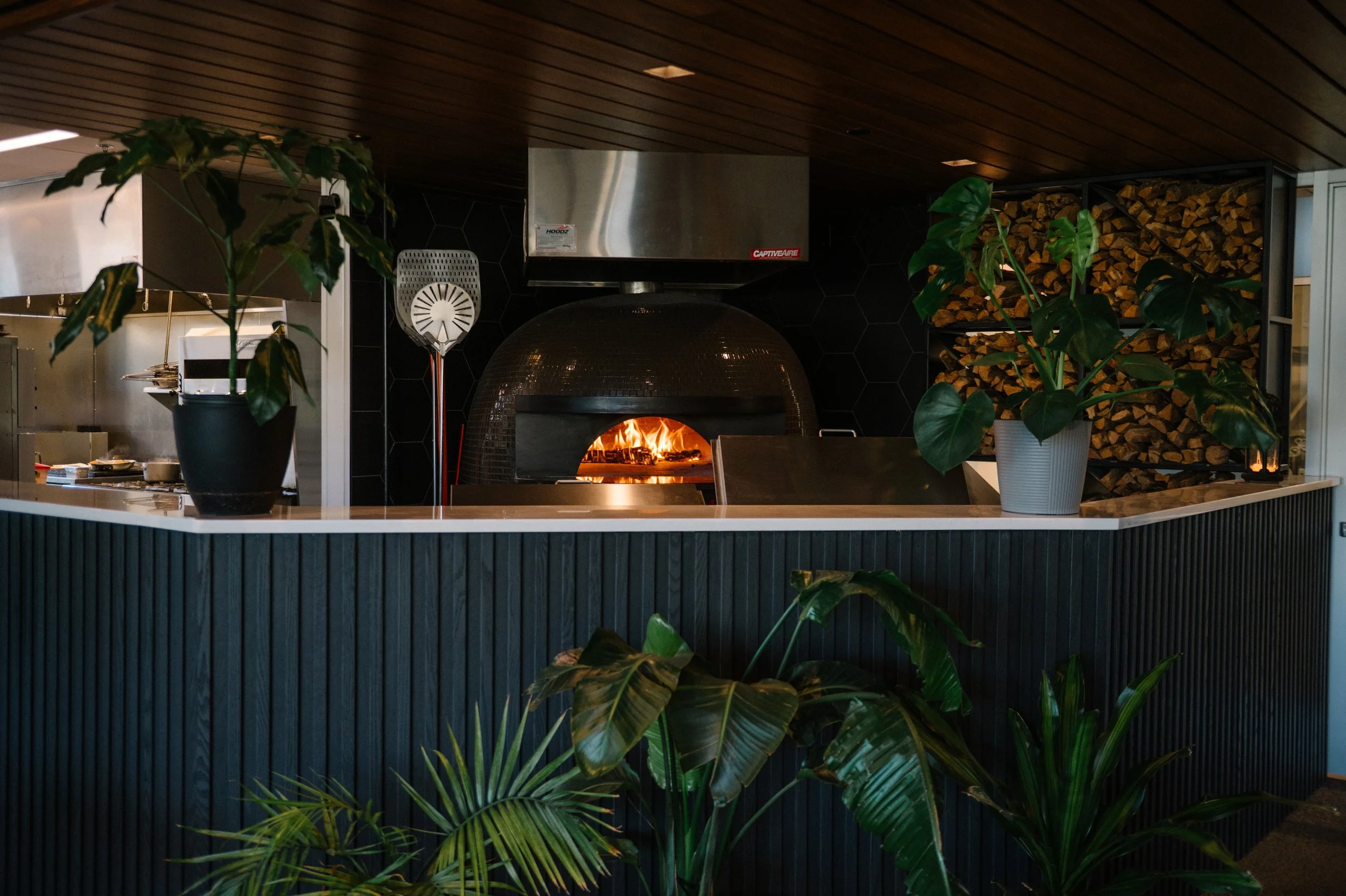 Interior of Hugo’s Wood-Fired Kitchen, a neighborhood restaurant near Drake University in Des Moines, Iowa