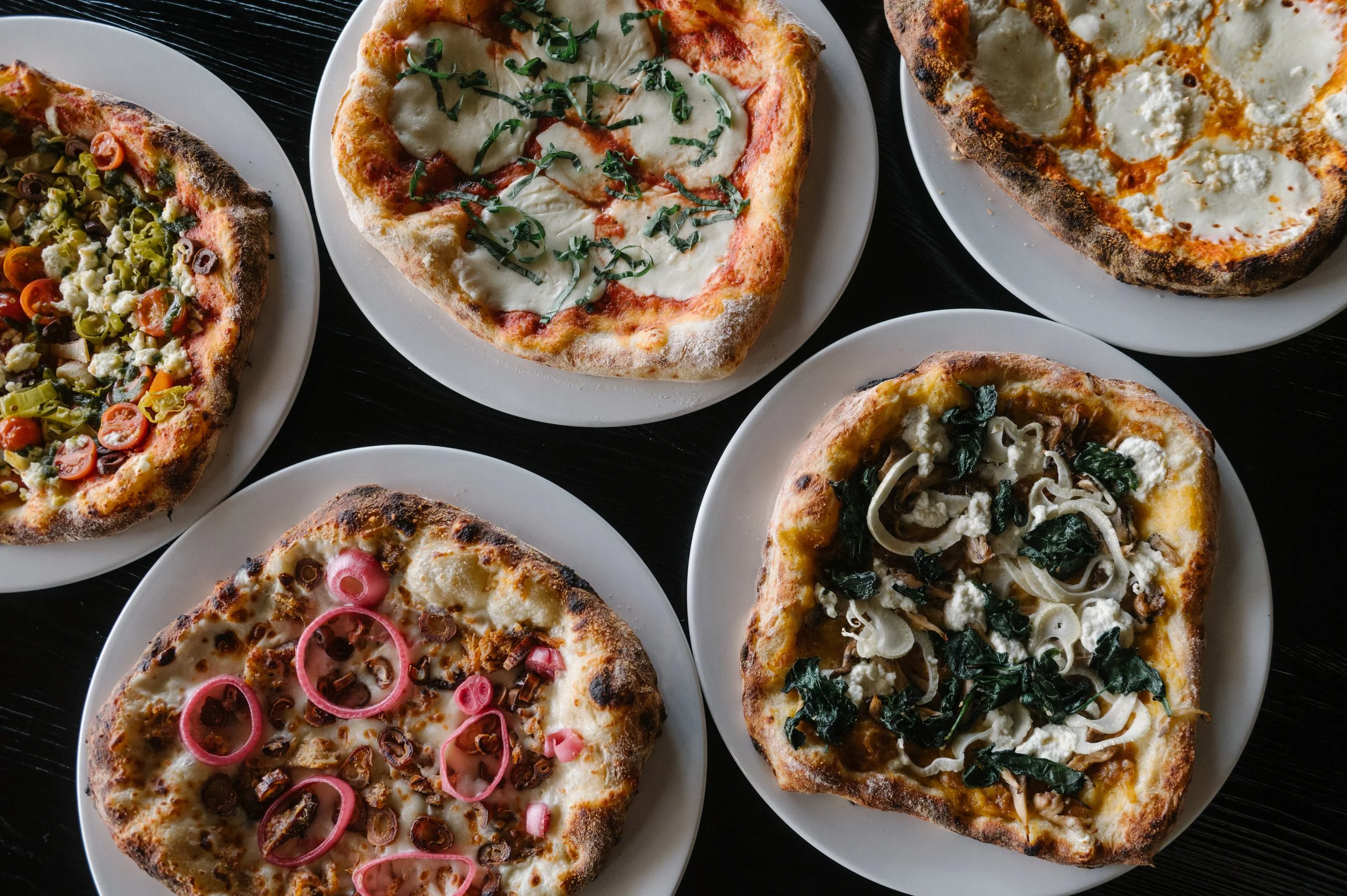 Wood-fired pizza in Des Moines at Hugo’s Wood-Fired Kitchen near Drake University