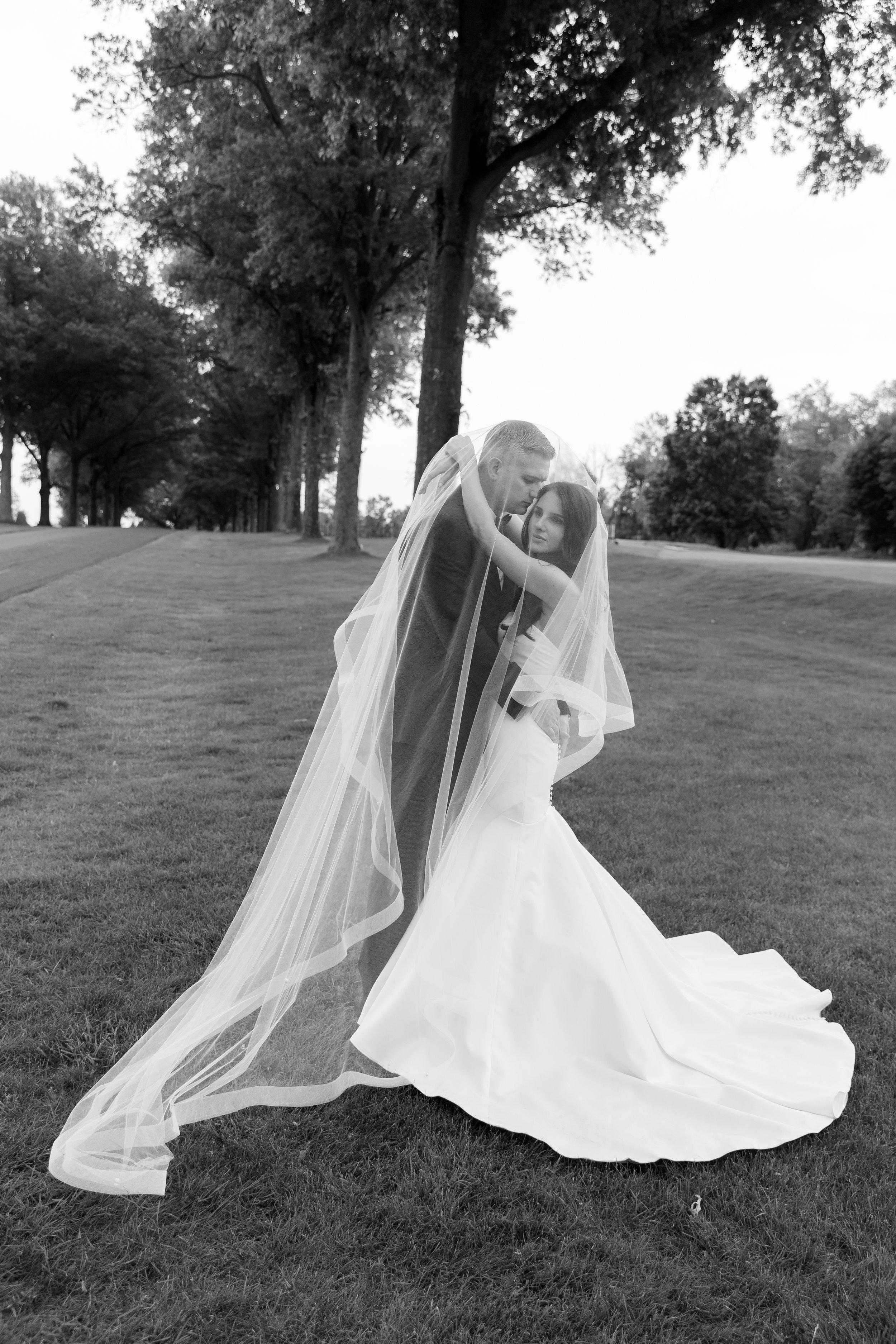 Bride and groom share an intimate moment during their Philadelphia wedding, Cedarbrook Country Club