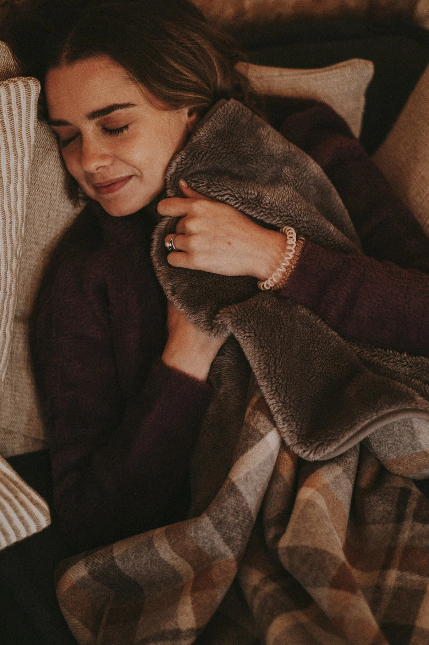 Catarina resting wrapped in a blanket