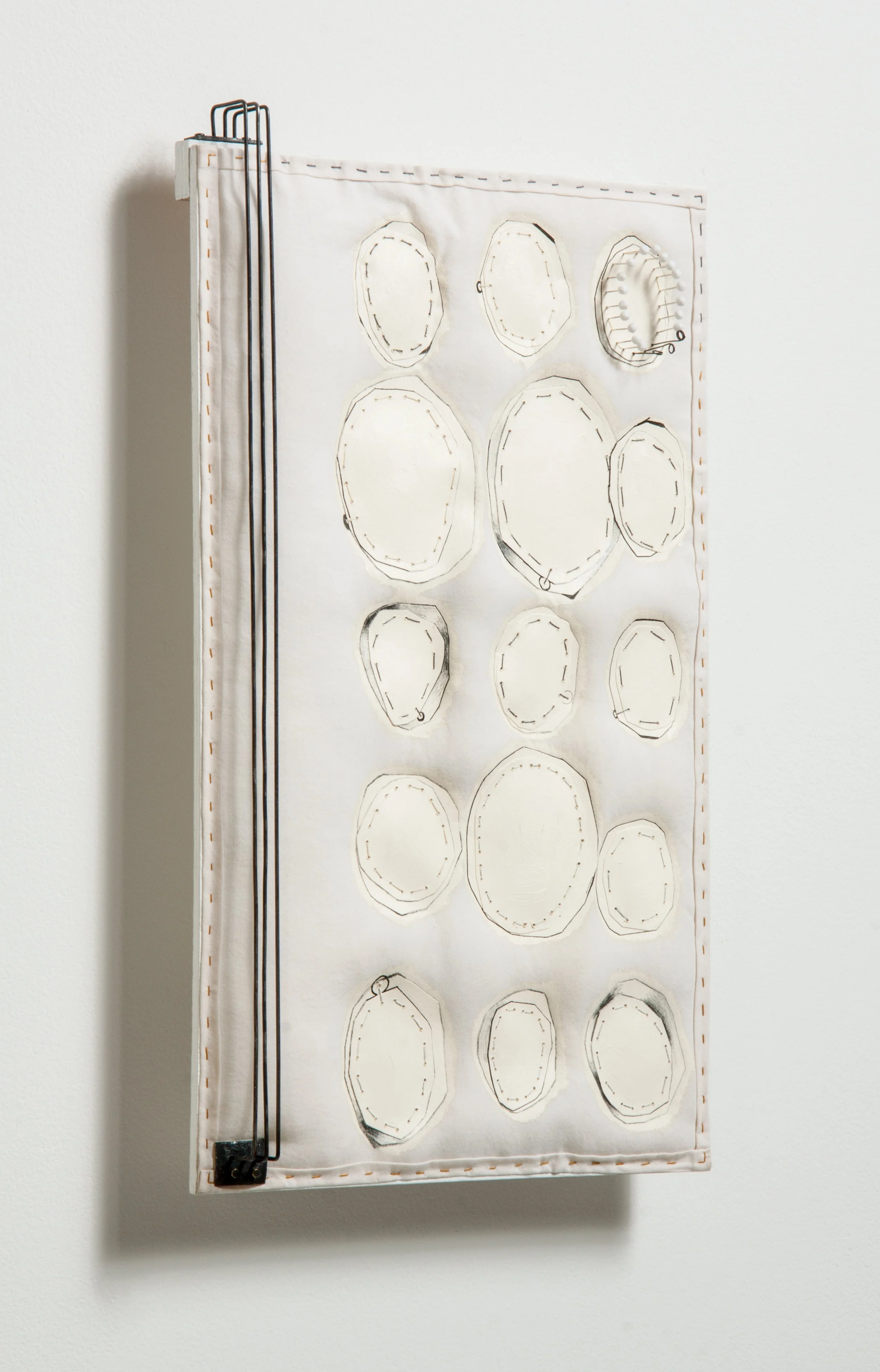 quiet optimists ignored the cracks in the clouds (2016-17), fabric, thread, sewing pins, wire, paper, forged and welded iron, on wood panel, 16.5 x 9.5 x 2.5 inches