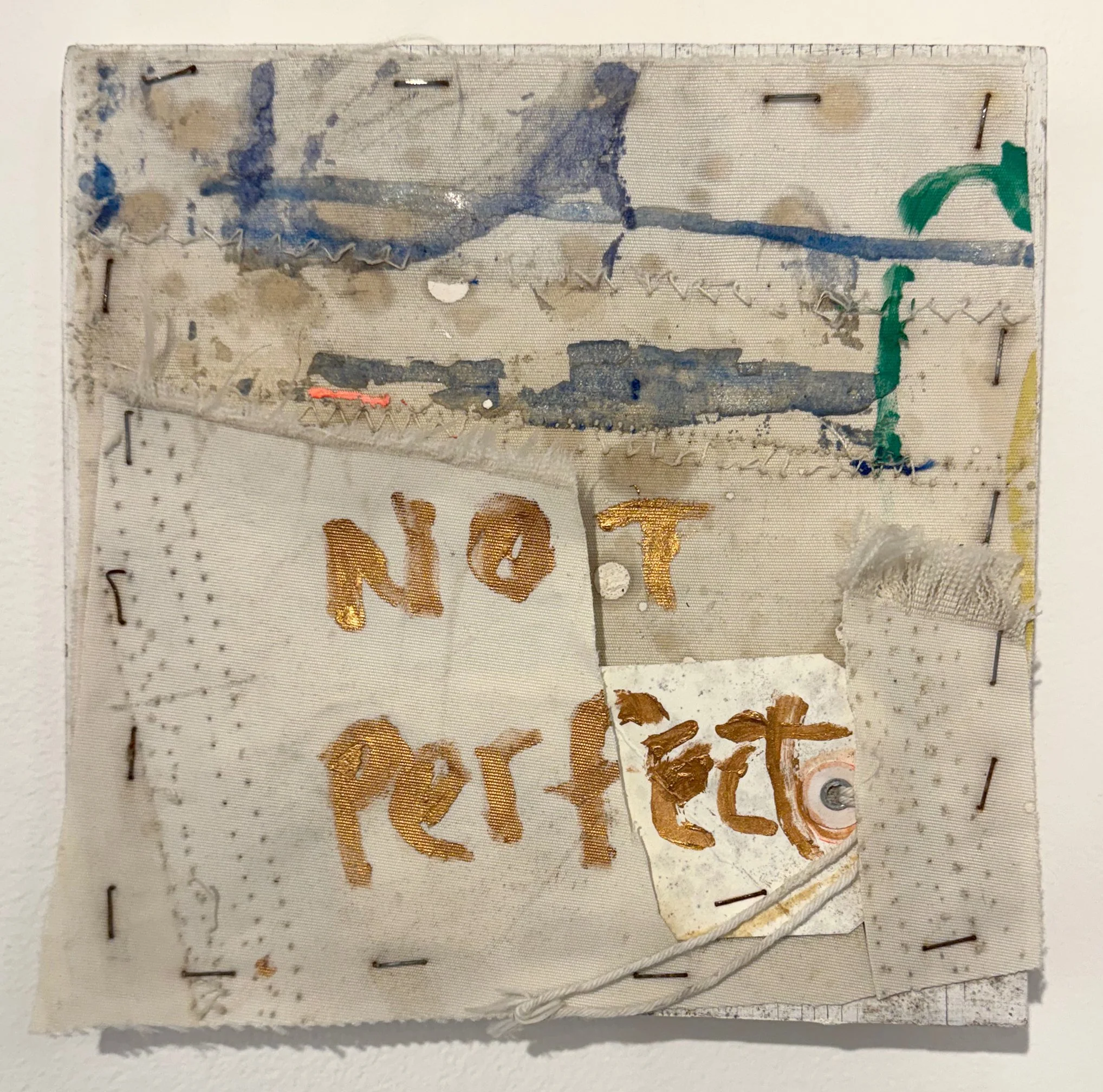 Not Perfect, 2026, oil and staples on sailcloth on wood, 8 x 8 inches