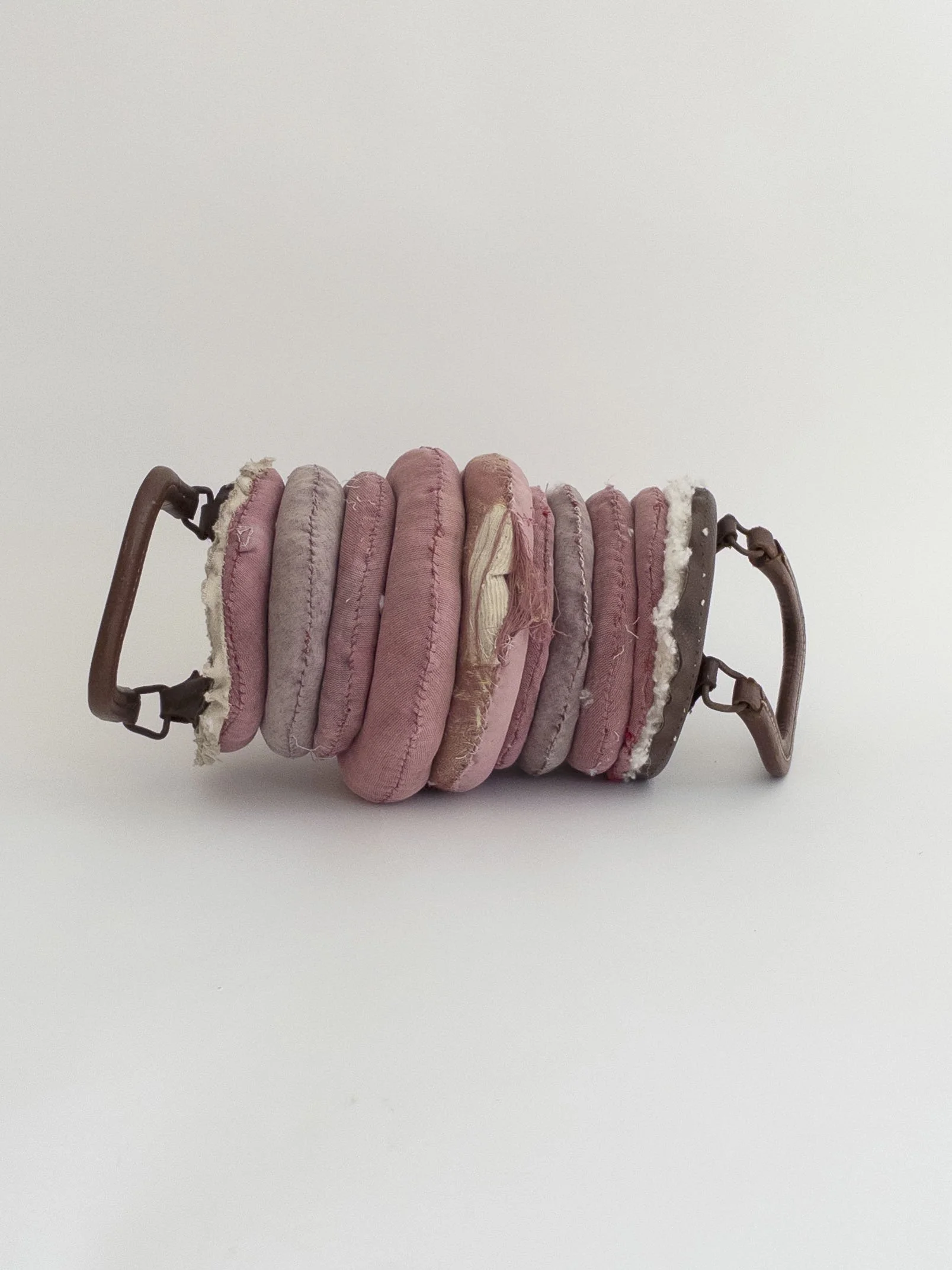 Squadge, 2026, metal, vinyl, cotton, 19.5 x 7.5 x 7.5 inches