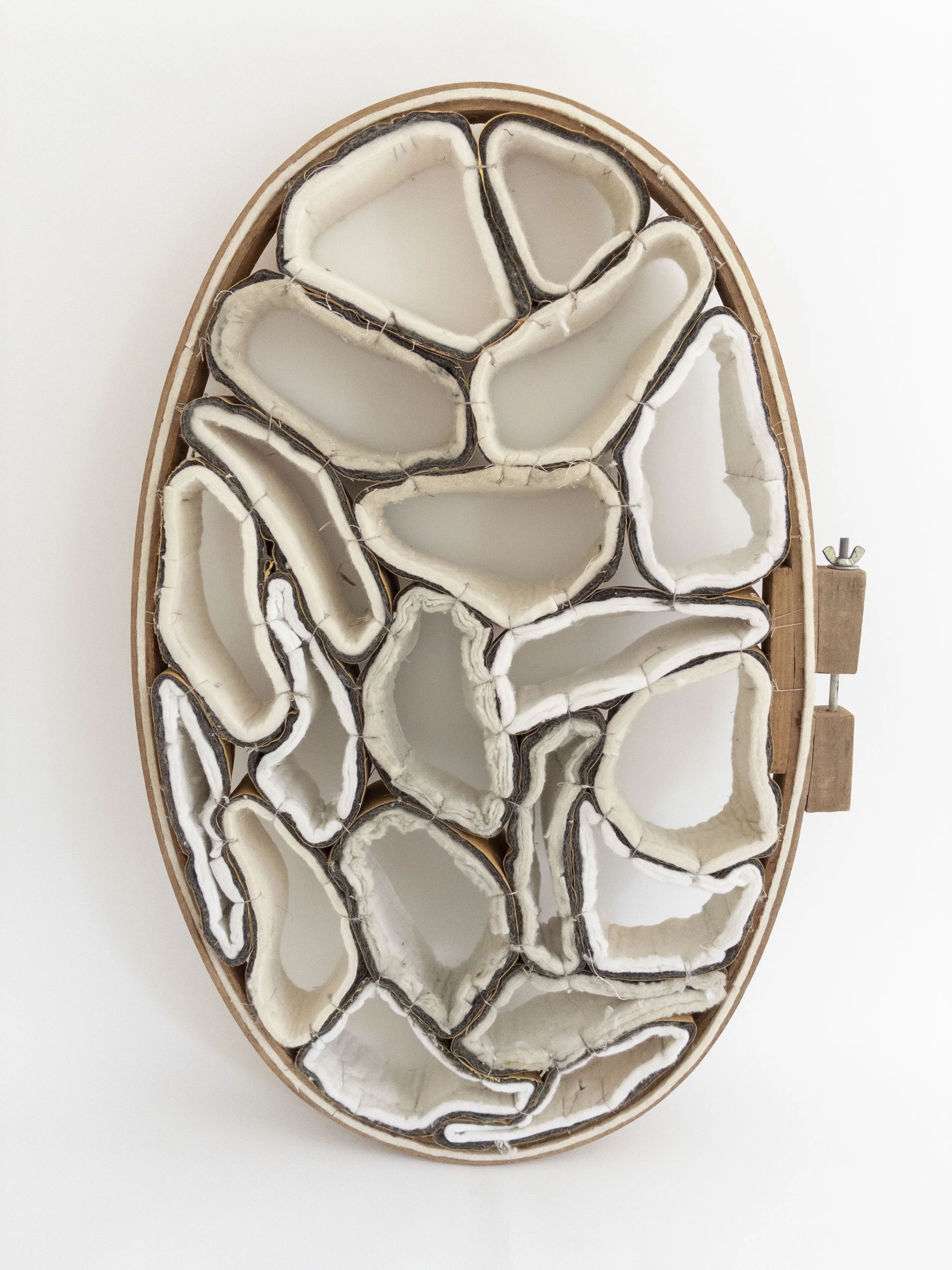 Intercellular I, 2026, wood, vinyl, cotton, wool. 28 x 18.5 x 4 inches