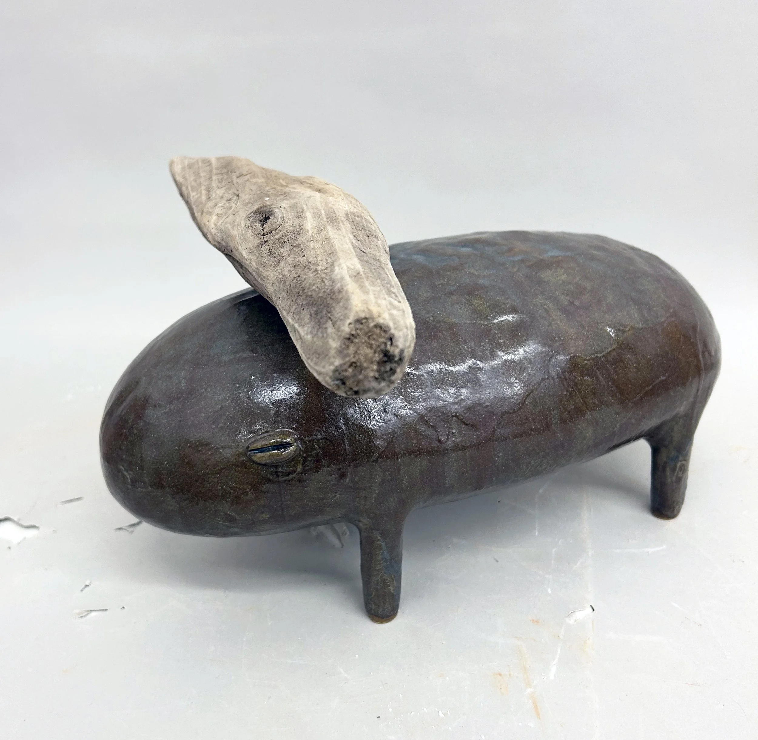Fauna #6, 2023, ceramic and wood, 8 x 11 x 13”