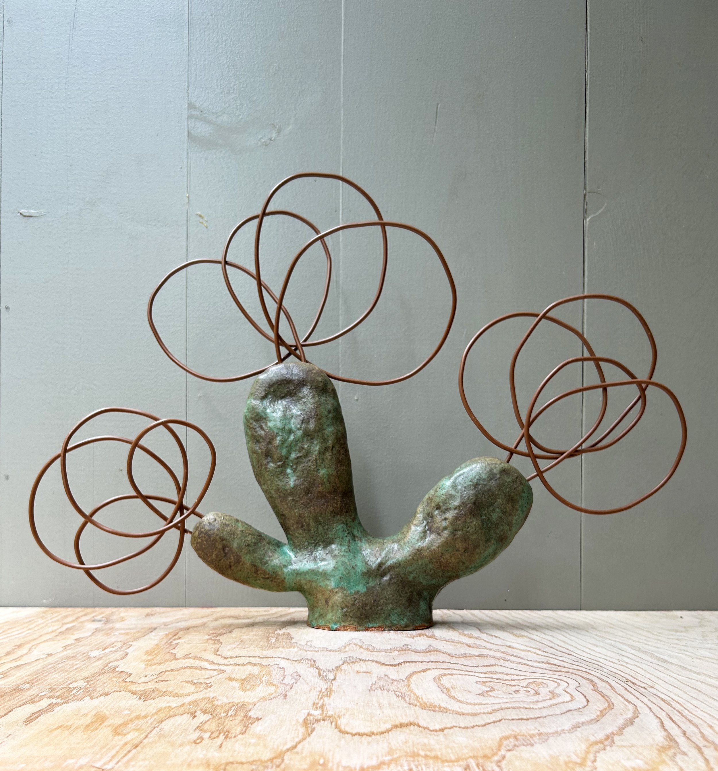 Flora # 28, 2024, Ceramic and electric wire, 17x3.5x24"