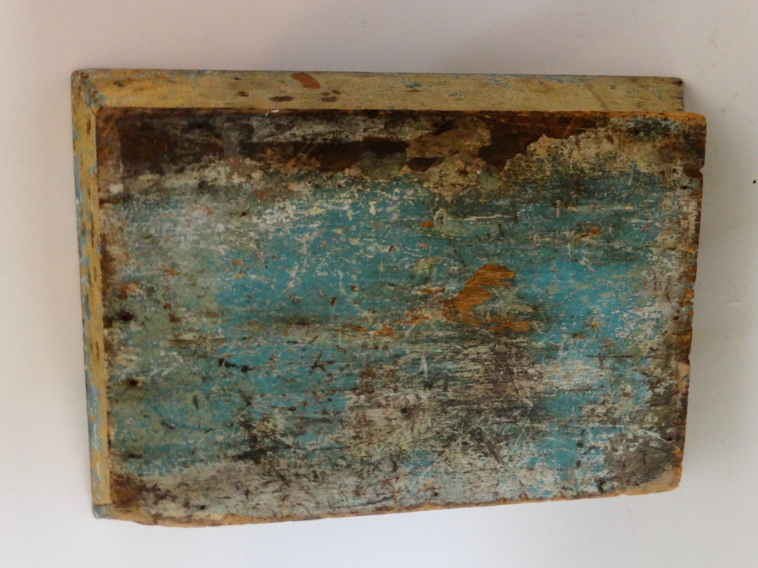 Back view of early American folk art cutlery tray showing original dry mustard paint.