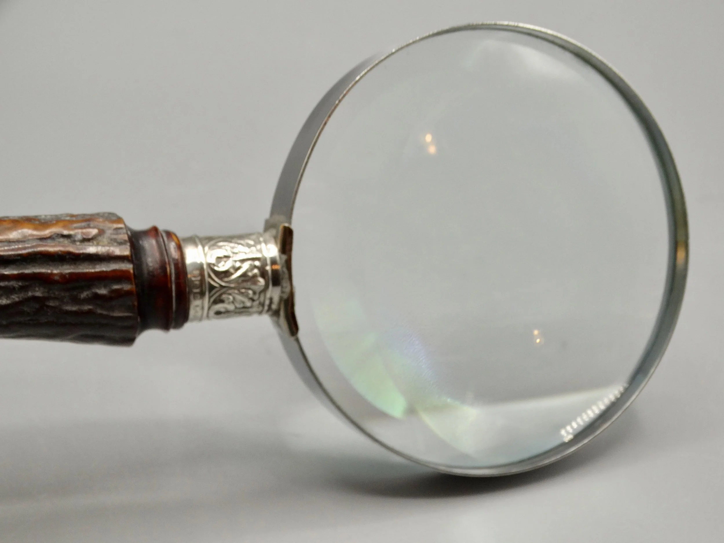 Clear Hilkinson glass lens on antique sterling and stag magnifying glass, perfect for reading fine print
