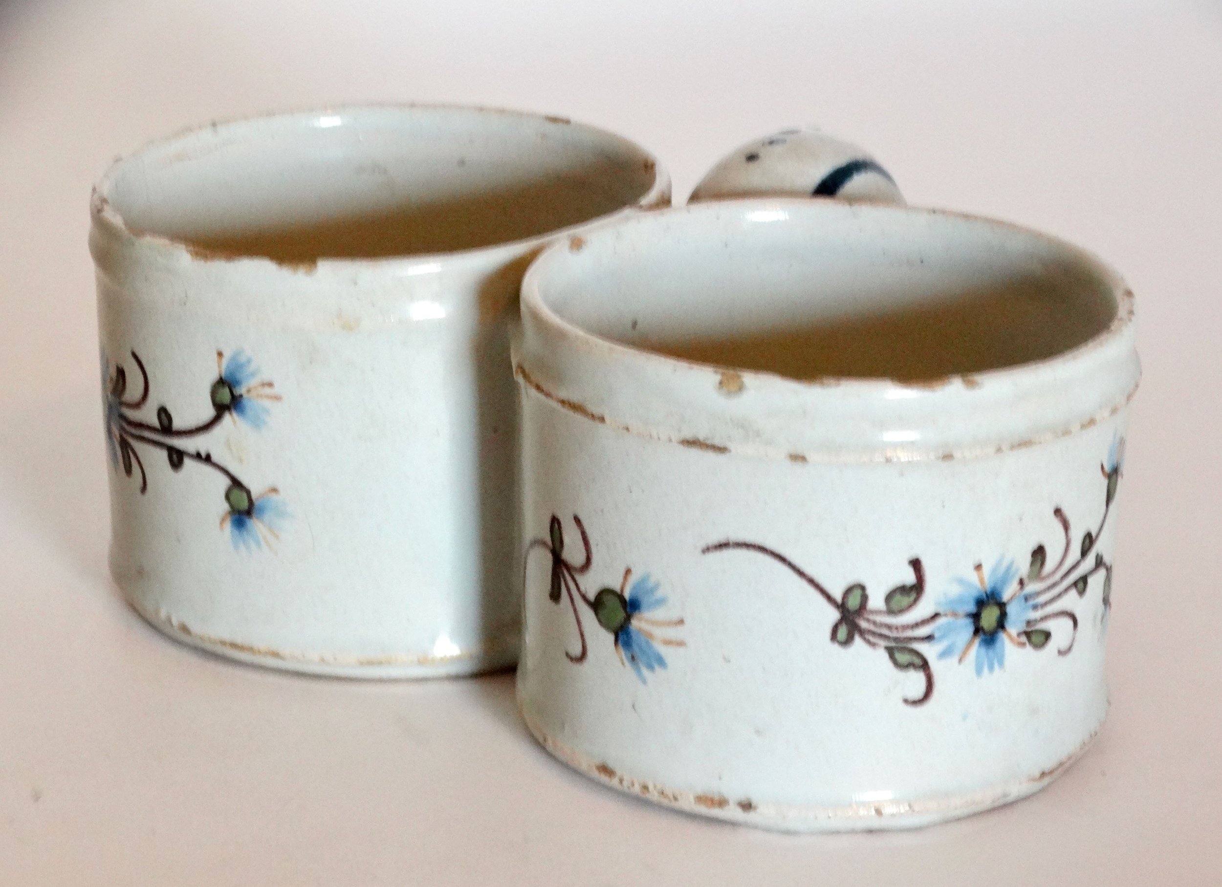 18th-century Delft faience presentier double dish, hand molded and hand painted with polychrome floral pattern