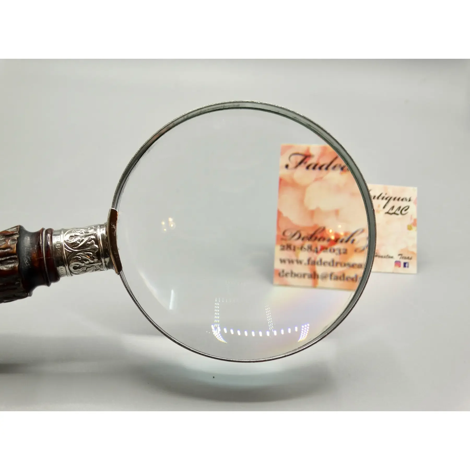 Clear Hilkinson glass lens on antique sterling and stag magnifying glass, perfect for reading fine print