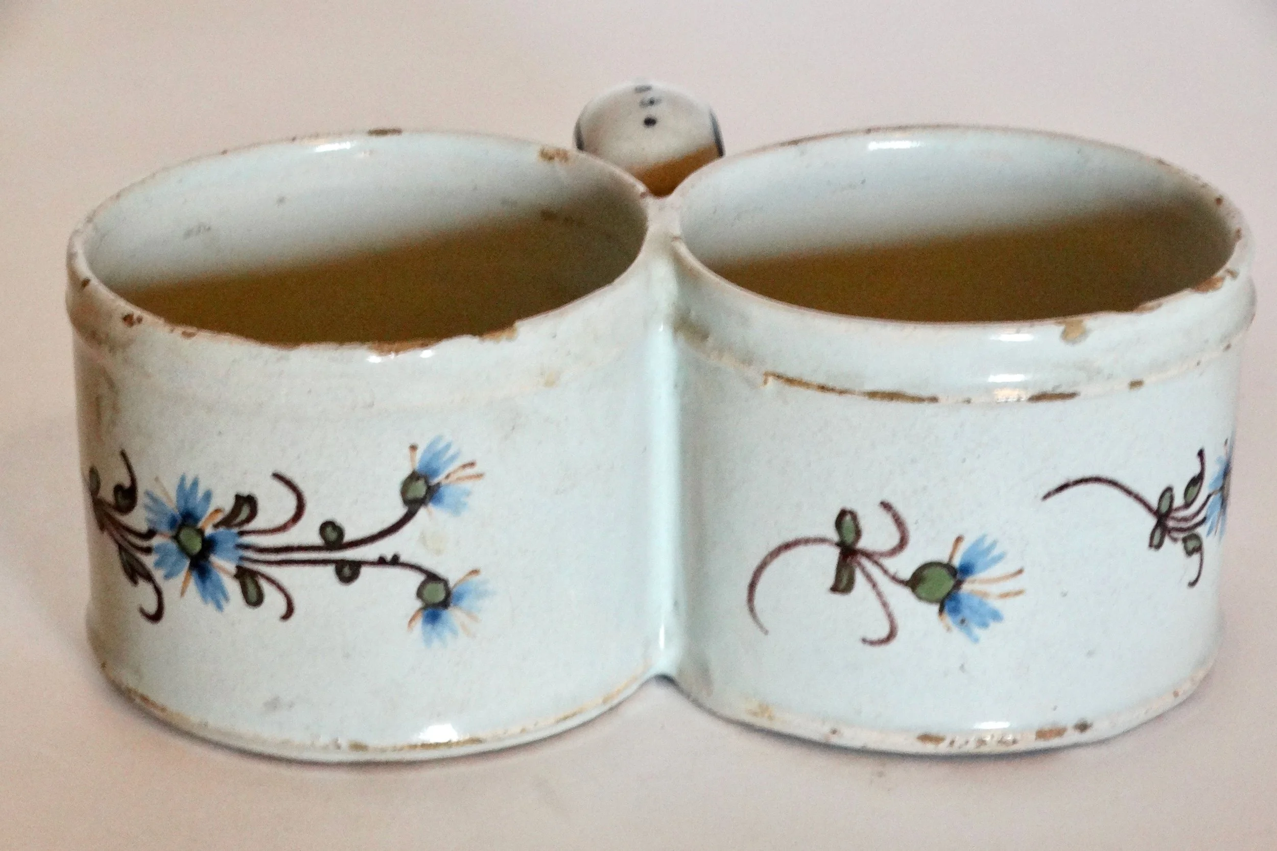 18th-century Delft faience presentier double dish, hand molded and hand painted with polychrome floral pattern