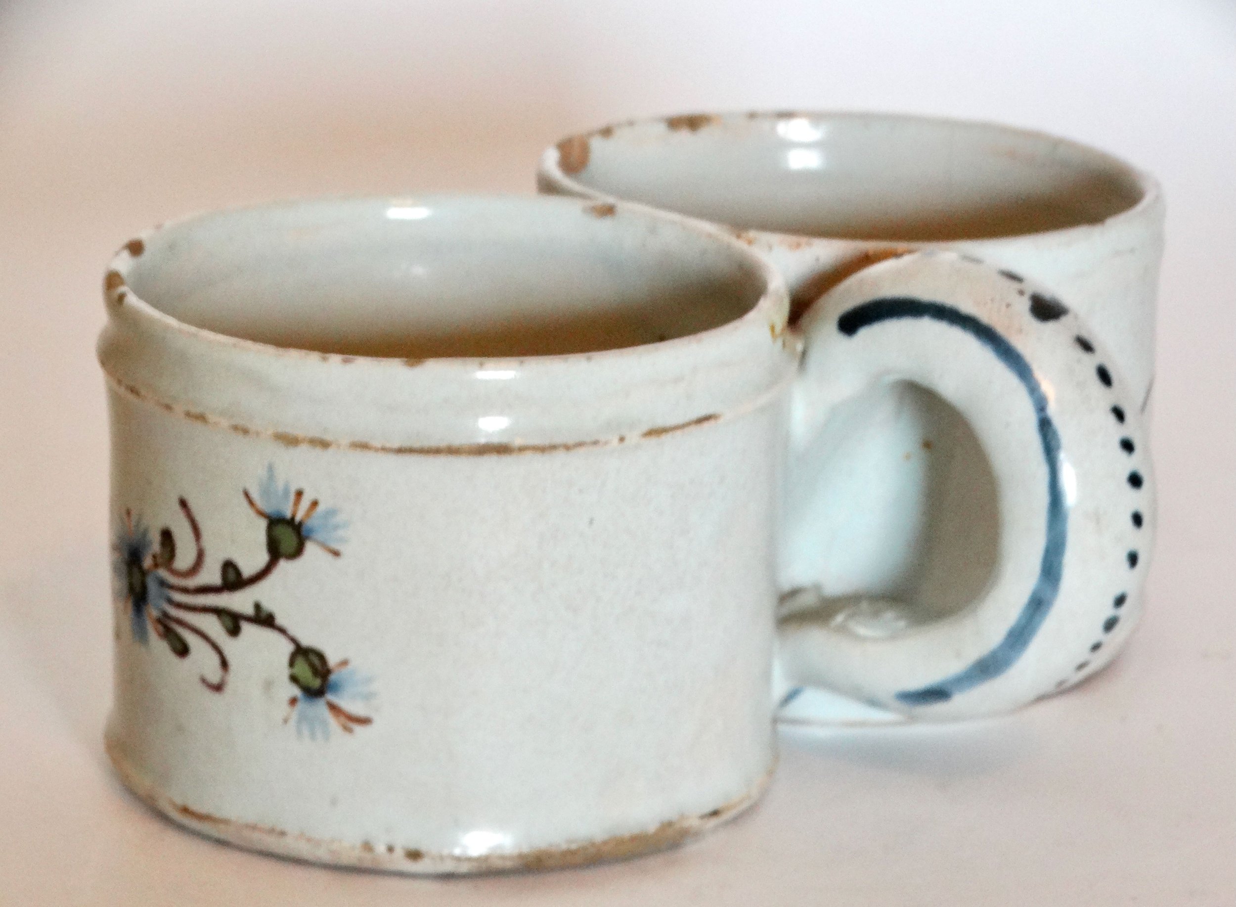 Close-up of second dish on 18th-century Delft faience presentier, hand painted floral pattern and border
