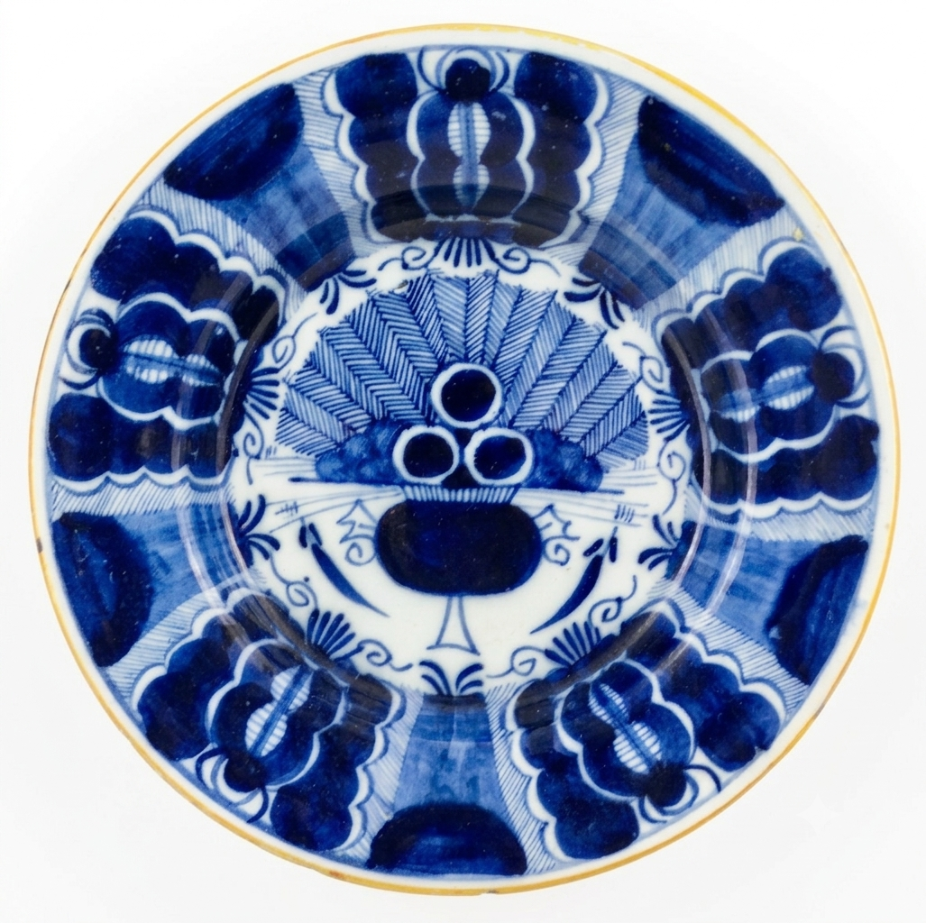 26-55 Delft peacock pl.png
