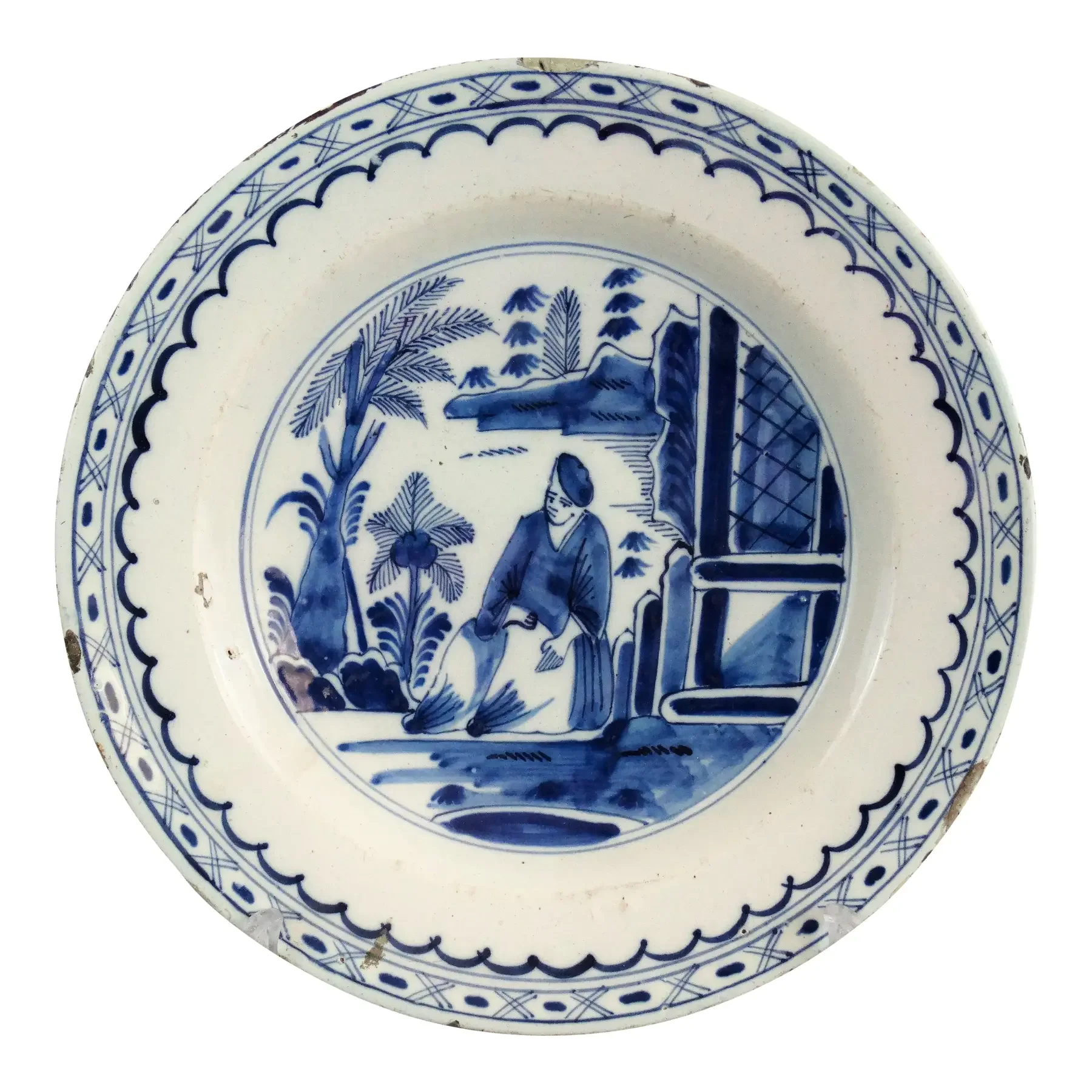 18th-century Dutch Delftware chinoiserie charger with figure in landscape, blue and white faience pottery