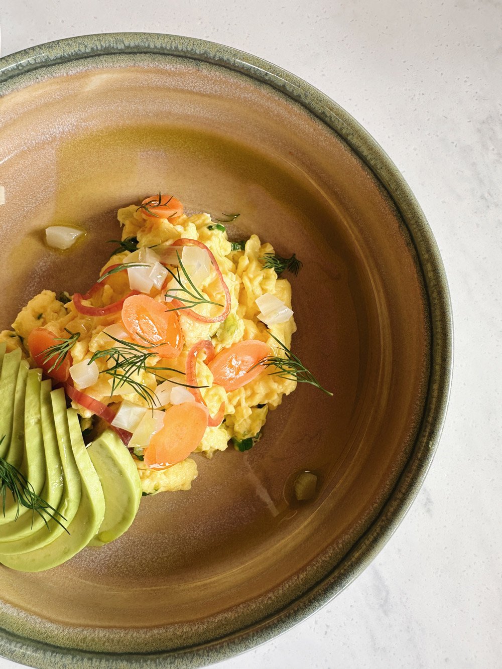 NY Scramble breakfast with a side of avocado
