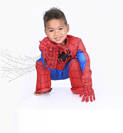 3 year boy in spiderman costume birthday photoshoot