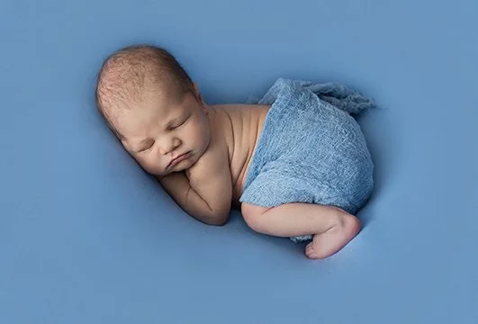 how to choose a newborn photographer