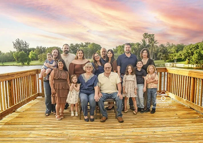 family-pictures-near-me extended family photoshoot on a wooden bridge