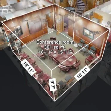3D model of a conference room measuring 301 sq. ft. (18’11” x 15’11”), showing detailed interior layout with furniture and dimensions.